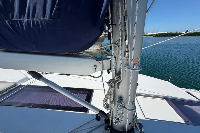 Ce Ya Yacht Photos Pics 2021 Leopard 45 sailboat mast and rigging detail on calm water.