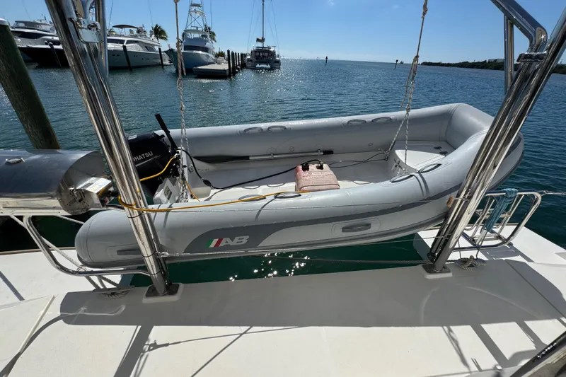 Ce Ya Yacht Photos Pics Inflatable boat on Leopard 45 catamaran, docked at marina, sunny day, 2021 model.