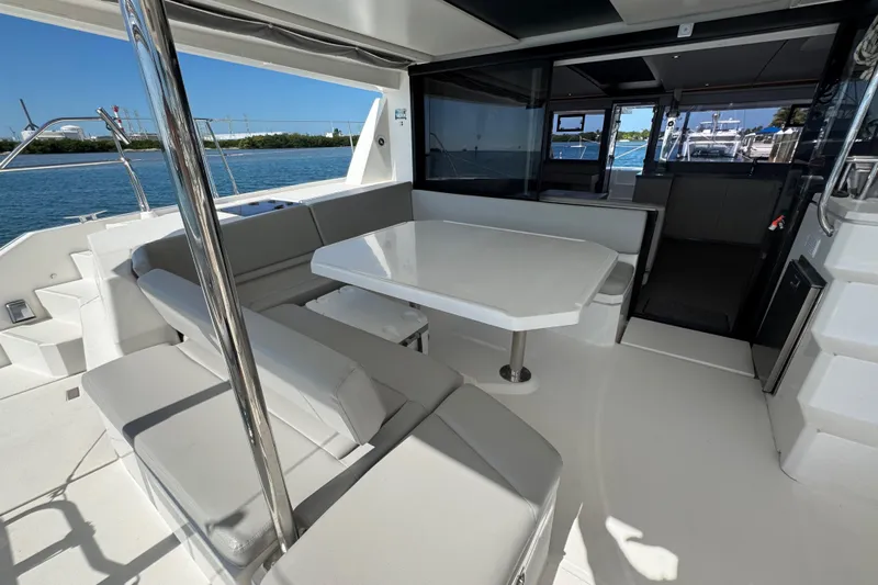 Ce Ya Yacht Photos Pics Leopard 45 catamaran 2021 model, featuring spacious outdoor seating and dining area.