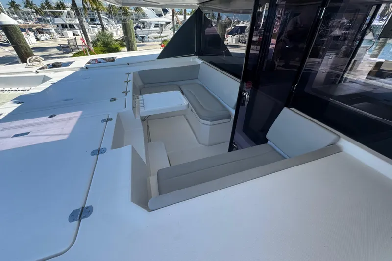 Ce Ya Yacht Photos Pics Leopard 45 yacht 2021 model with spacious outdoor seating area at marina.