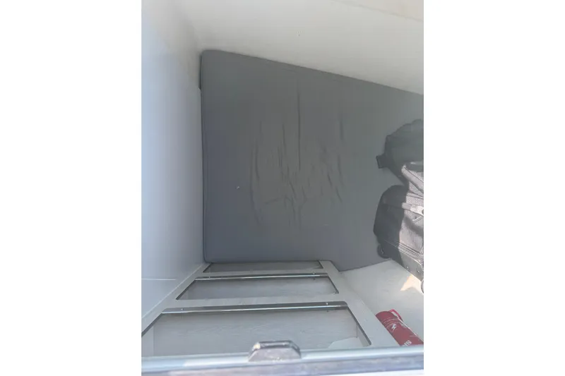 Ce Ya Yacht Photos Pics Interior cabin space of a 2021 Leopard 45 yacht with mattress and luggage.