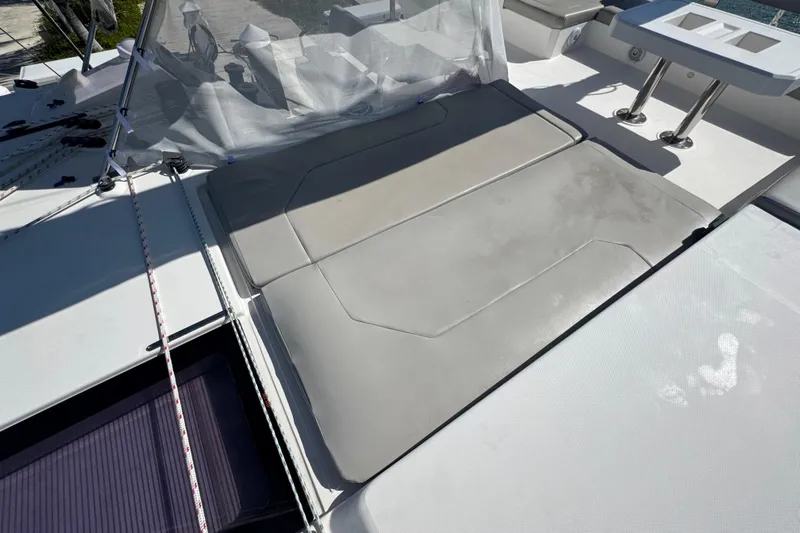 Ce Ya Yacht Photos Pics Leopard 45 catamaran deck with cushioned seating and table, 2021 model.