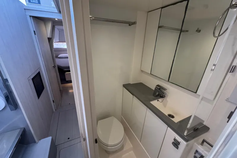 Ce Ya Yacht Photos Pics Modern bathroom interior on a 2021 Leopard 45 yacht, featuring sleek design and amenities.