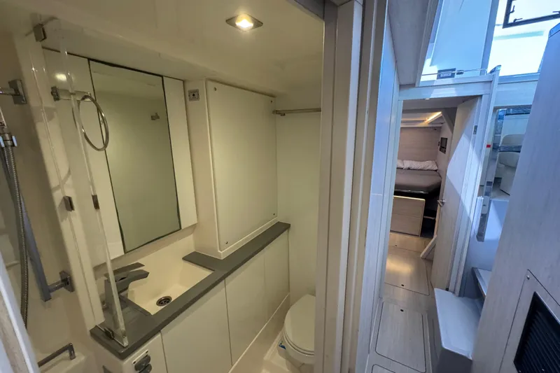 Ce Ya Yacht Photos Pics Modern bathroom and cabin interior of a 2021 Leopard 45 yacht.