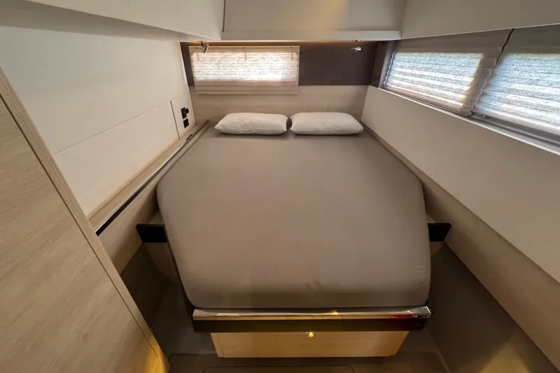 Ce Ya Yacht Photos Pics Luxurious bedroom interior of 2021 Leopard 45 yacht with modern design.