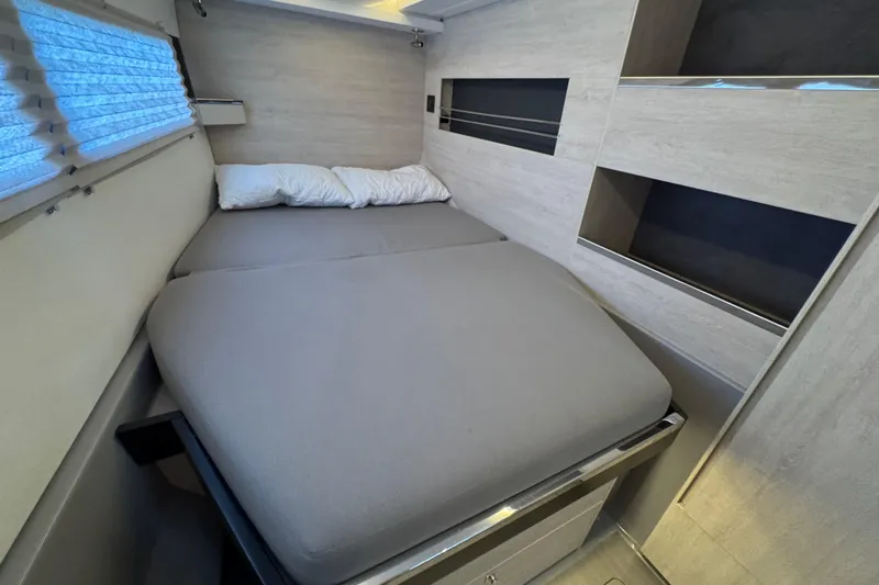 Ce Ya Yacht Photos Pics Cozy bedroom interior in 2021 Leopard 45 catamaran with modern design and comfortable bedding.