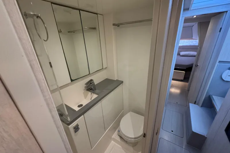 Ce Ya Yacht Photos Pics Modern bathroom in 2021 Leopard 45 yacht, featuring sleek design and compact layout.