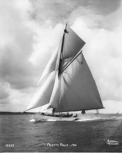 Juliette Yacht Photos Pics Vintage 1929 Custom Cutter Marconi sailboat, "Pretty Polly," sailing on open water.