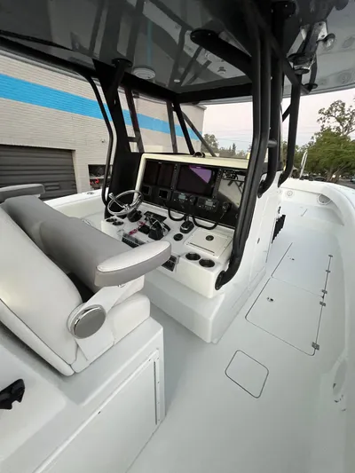  Yacht Photos Pics 2017 Freeman 37 VH boat cockpit with modern navigation equipment and seating.