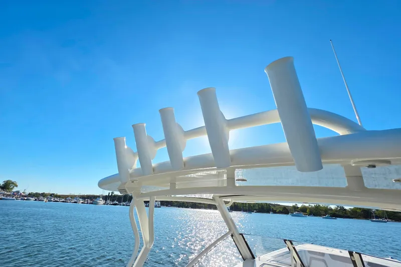  Yacht Photos Pics 2018 World Cat 280 DC-X boat with rod holders, sunny day on the water.