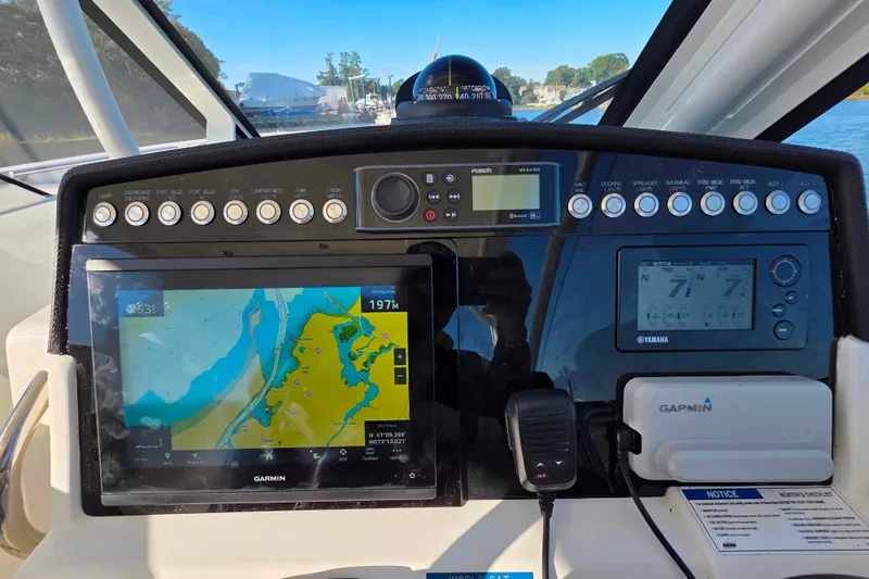  Yacht Photos Pics Dashboard of 2018 World Cat 280 DC-X with navigation and control systems.