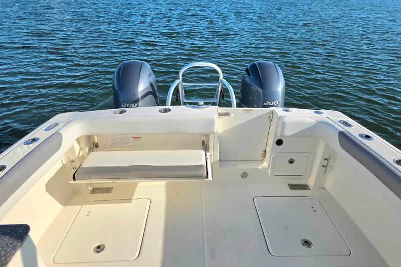  Yacht Photos Pics 2018 World Cat 280 DC-X boat deck with twin 200 engines on water.