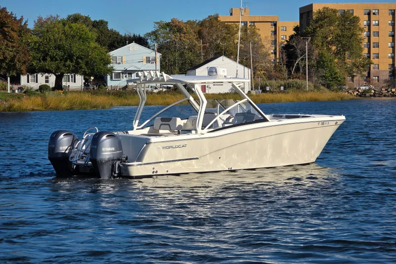  Yacht Photos Pics 2018 World Cat 280 DC-X boat on water with twin Yamaha engines.