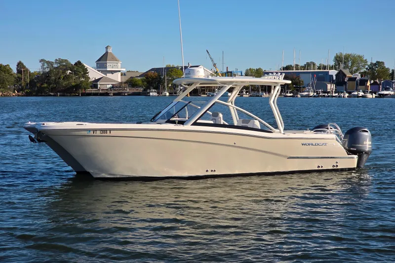  Yacht Photos Pics 2018 World Cat 280 DC-X boat on calm water near marina.