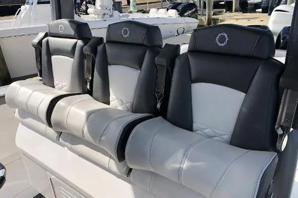 Yacht Photos Pics Luxury seating on 2020 Fountain 43 NX boat, featuring sleek black and white design.