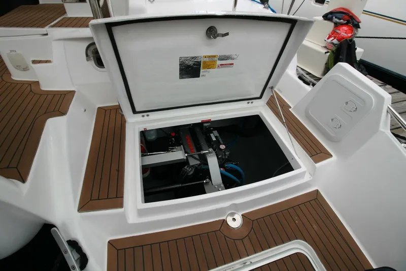 Laminic Yacht Photos Pics 2022 Maverick Yachts 440 Custom engine compartment with open hatch, showcasing interior components.