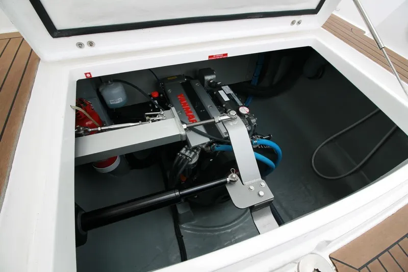 Laminic Yacht Photos Pics Engine compartment of 2022 Maverick Yachts 440 Custom, featuring Yanmar engine and equipment.