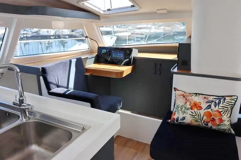 Laminic Yacht Photos Pics Interior of 2022 Maverick Yachts 440 Custom, featuring modern seating and navigation area.