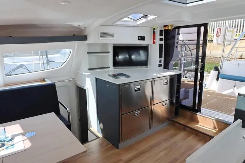 Laminic Yacht Photos Pics Interior of 2022 Maverick Yachts 440 Custom, featuring modern cabinetry and sleek design.