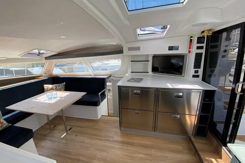 Laminic Yacht Photos Pics Interior of 2022 Maverick Yachts 440 Custom, featuring modern kitchen and dining area.