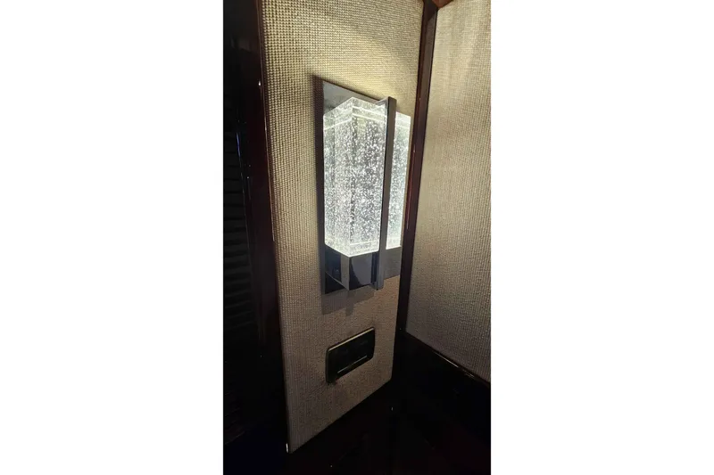  Yacht Photos Pics Wall-mounted light fixture on 2007 Sea Ray 60 Sundancer yacht interior.