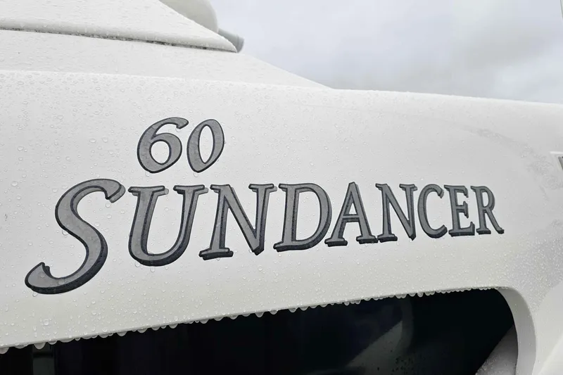  Yacht Photos Pics 2007 Sea Ray 60 Sundancer yacht nameplate with raindrops.