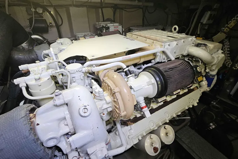  Yacht Photos Pics Engine room of 2007 Sea Ray 60 Sundancer yacht, showcasing detailed machinery components.