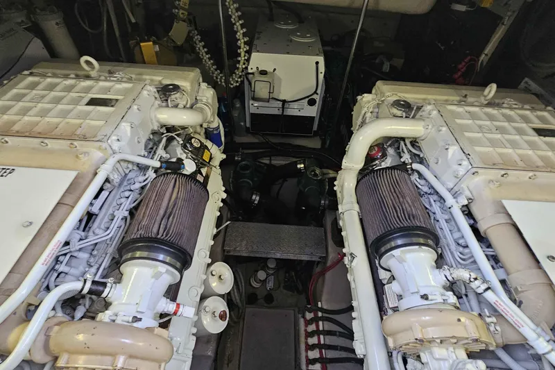  Yacht Photos Pics Engine room of a 2007 Sea Ray 60 Sundancer yacht, showcasing dual engines.