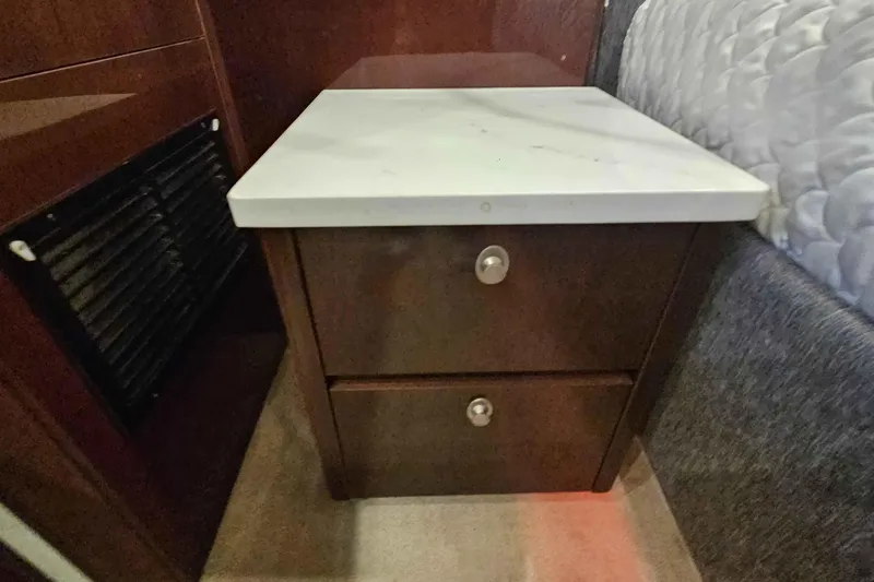  Yacht Photos Pics Wooden cabinet with marble top in 2007 Sea Ray 60 Sundancer yacht interior.