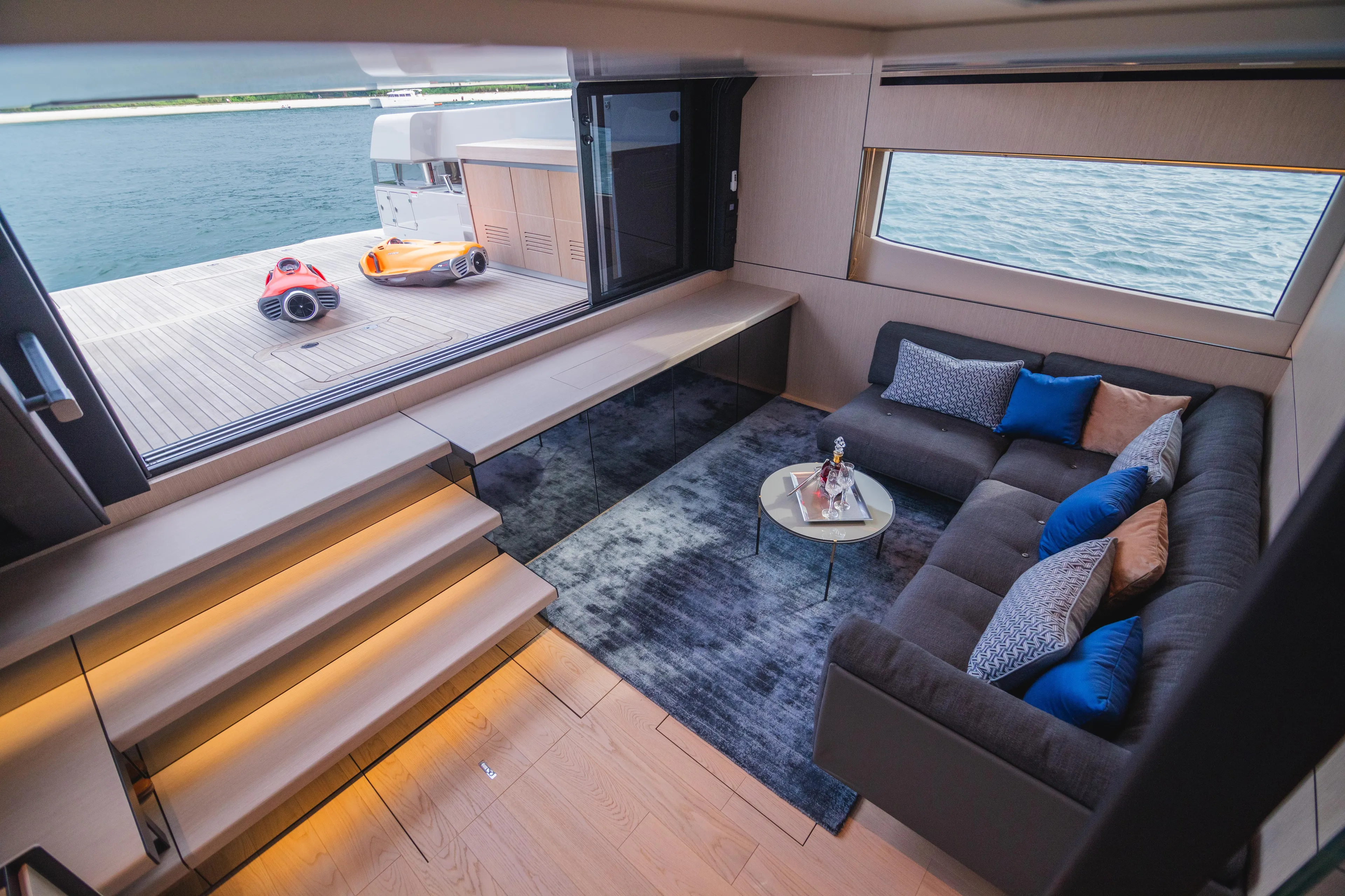  Yacht Photos Pics Luxurious 2023 Bluegame BGX60 yacht interior with modern seating and ocean view.