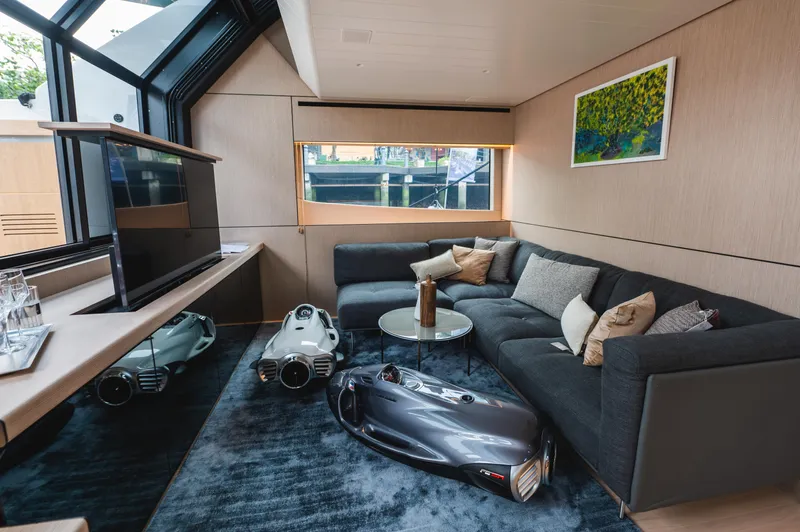  Yacht Photos Pics Luxurious interior of 2023 Bluegame BGX60 yacht with modern furnishings and decor.