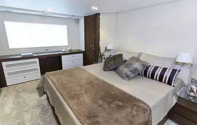  Yacht Photos Pics Luxurious bedroom interior in 2026 Schaefer 25M yacht, featuring elegant decor and plush bedding.