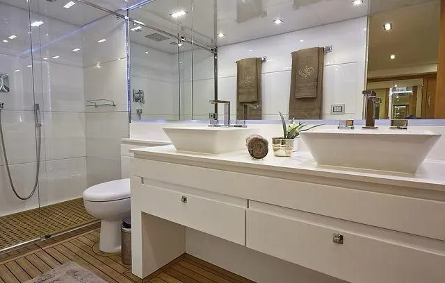  Yacht Photos Pics Luxurious bathroom in 2026 Schaefer 25M yacht with dual sinks and modern fixtures.