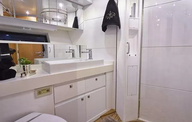  Yacht Photos Pics Luxurious bathroom interior of 2026 Schaefer 25M yacht with modern fixtures and elegant design.
