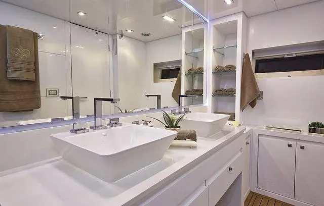  Yacht Photos Pics Luxurious bathroom in 2026 Schaefer 25M yacht with dual sinks and modern fixtures.
