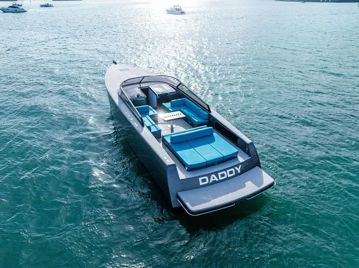 Daddy Yacht Photos Pics VanDutch 55 yacht, 2015 model, cruising on open water with luxurious seating.