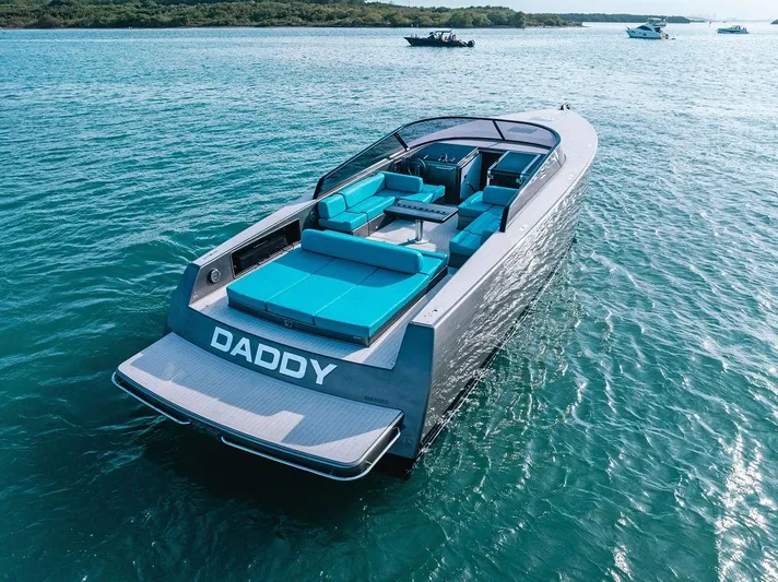 Daddy Yacht Photos Pics Luxury 2015 VanDutch 55 yacht with turquoise seating on open water.