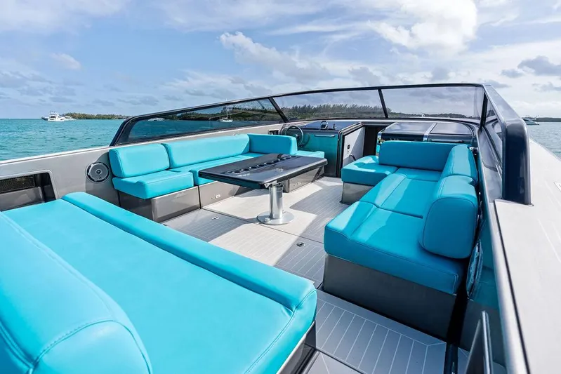Daddy Yacht Photos Pics Luxurious 2015 VanDutch 55 yacht with turquoise seating and sleek design on open water.