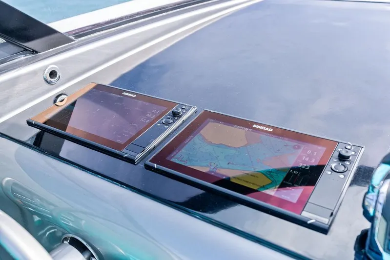 Daddy Yacht Photos Pics Navigation screens on a 2015 VanDutch 55 yacht dashboard.