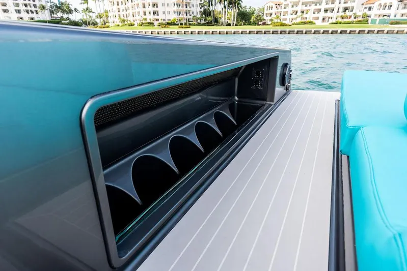 Daddy Yacht Photos Pics 2015 VanDutch 55 yacht interior detail with sleek storage compartment by the water.
