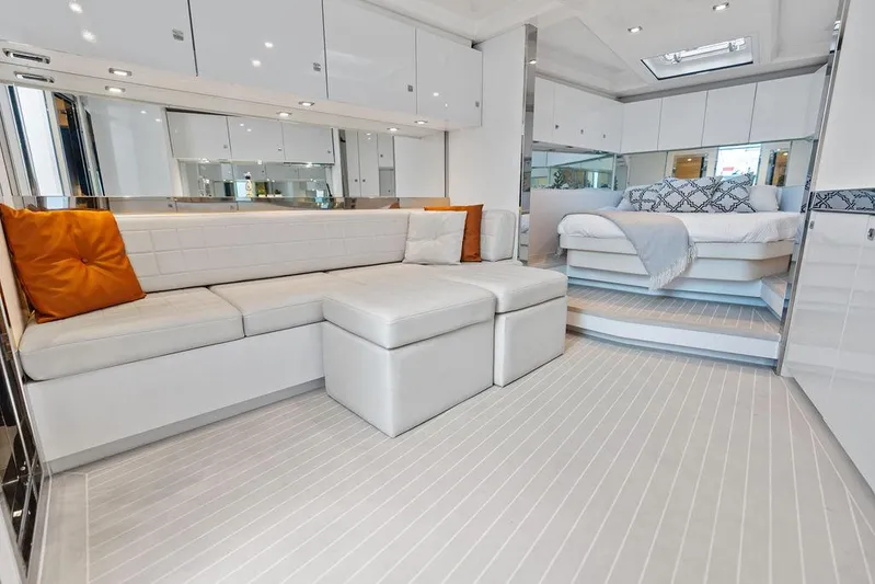 Daddy Yacht Photos Pics Luxurious interior of 2015 VanDutch 55 yacht with white seating and modern decor.