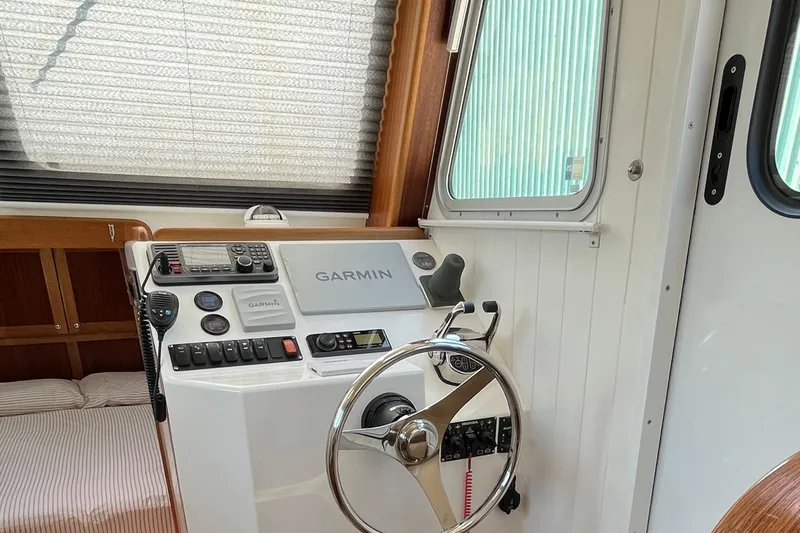 Lenore Yacht Photos Pics Great Harbour Trawlers TT35 helm with Garmin navigation, 2023 model interior view.