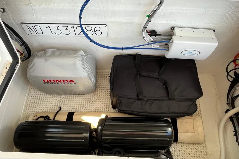 Lenore Yacht Photos Pics Storage compartment of 2023 Great Harbour TT35 with Honda generator and equipment.