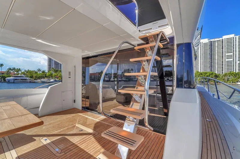  Yacht Photos Pics Luxurious Sunseeker Manhattan 68 yacht deck with modern staircase, 2023 model.