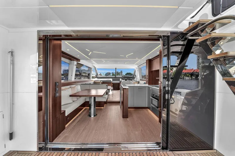  Yacht Photos Pics Luxurious interior of 2023 Sunseeker Manhattan 68 yacht with modern design and spacious layout.