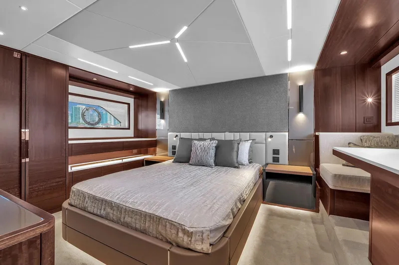  Yacht Photos Pics Luxurious 2023 Sunseeker Manhattan 68 yacht bedroom with modern design and elegant furnishings.