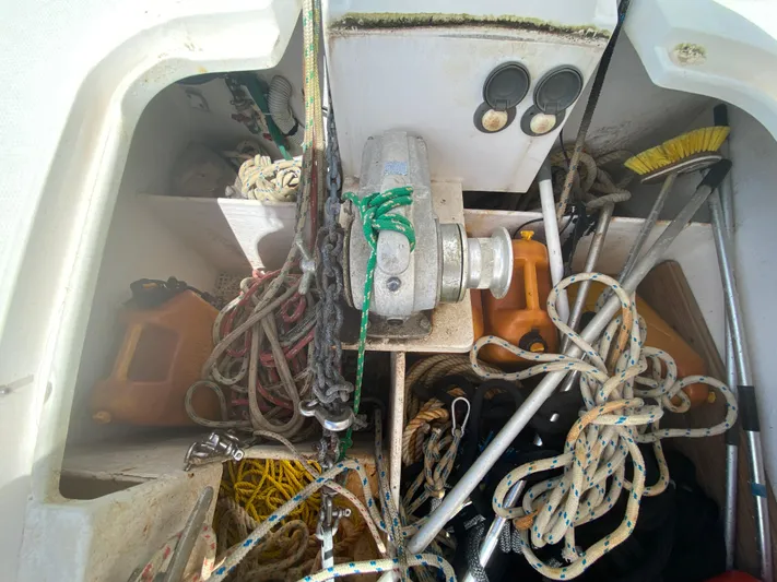 Certitude Yacht Photos Pics Storage compartment of a 1998 Fountaine Pajot Bahia 46 with ropes and equipment.