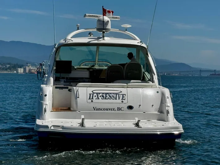 Ii-x-sessive Yacht Photos Pics 2006 Sea Ray 48 Sundancer yacht on water, Vancouver backdrop.