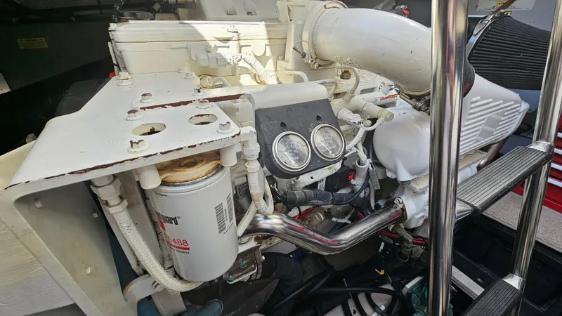 Ii-x-sessive Yacht Photos Pics Engine compartment of a 2006 Sea Ray 48 Sundancer yacht, showcasing mechanical components.