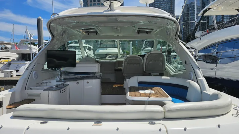 Ii-x-sessive Yacht Photos Pics 2006 Sea Ray 48 Sundancer yacht with spacious seating and outdoor entertainment area.